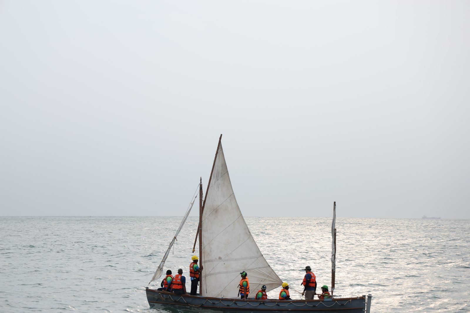 Cadets crewing a whaler under full sail on the final approach to Chennai