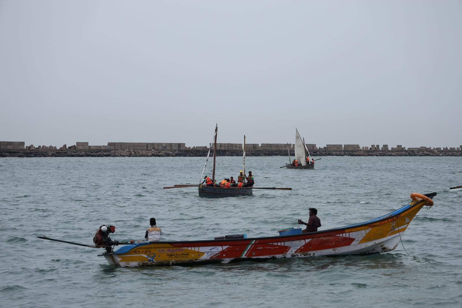 Traditional fishing boat and NCC whaler off the Chennai coast