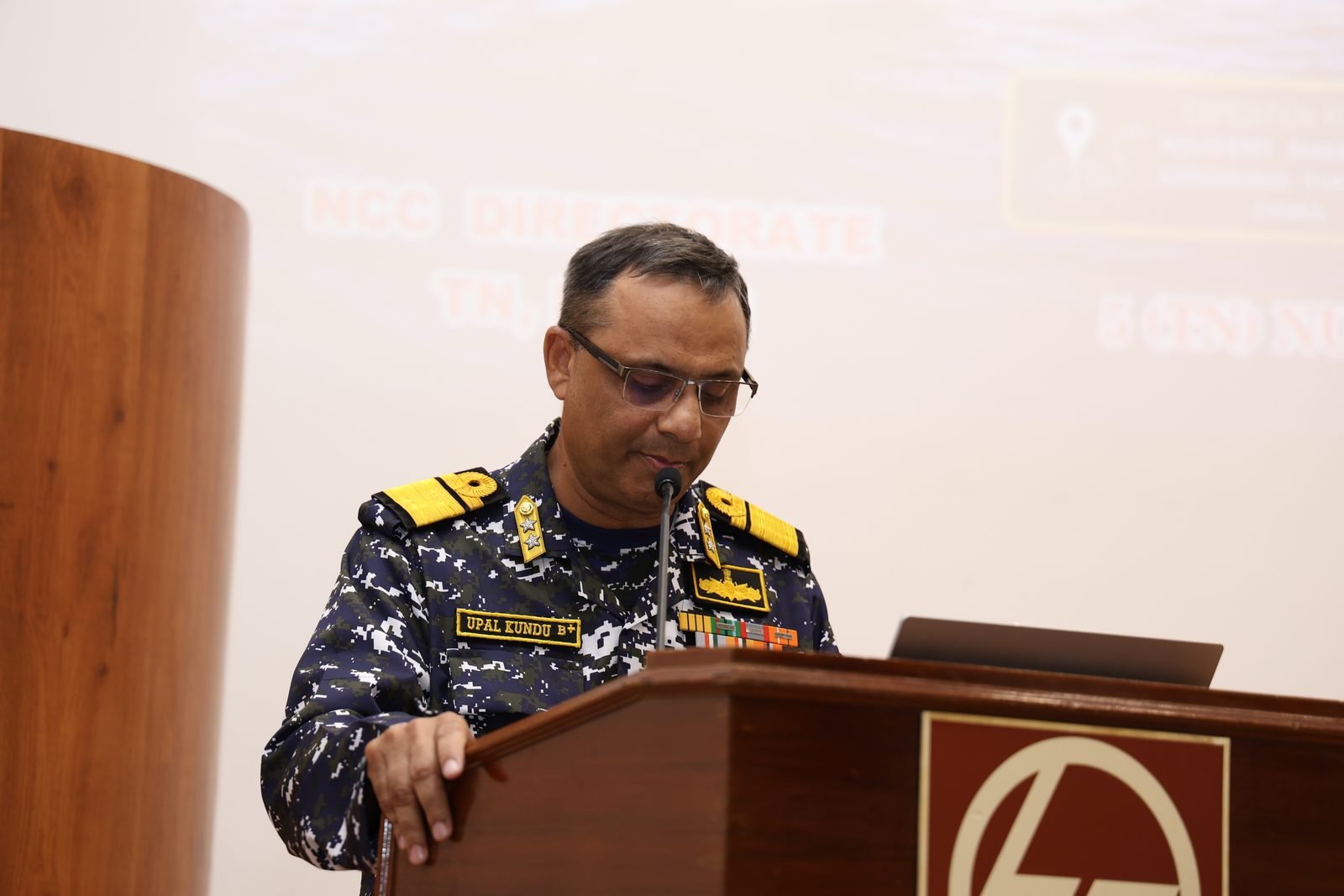 Naval officer addressing the gathering at the closing ceremony