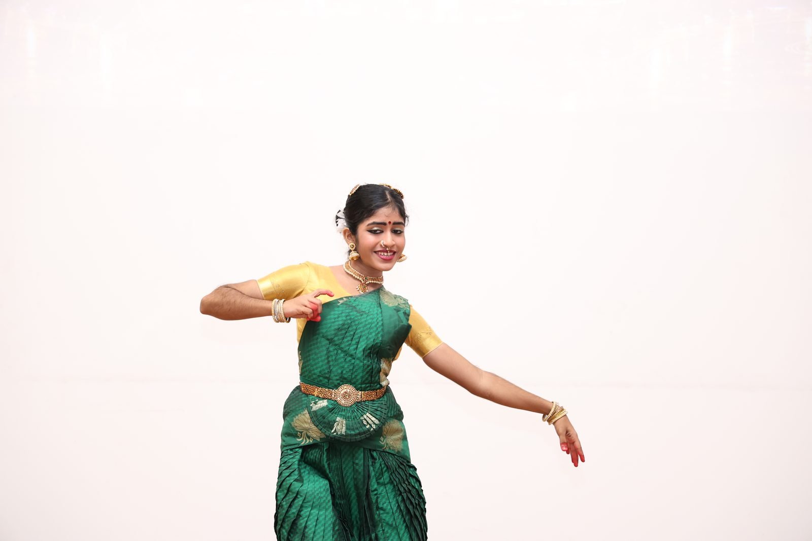 Classical dancer performing at the Project SWARNUM closing ceremony