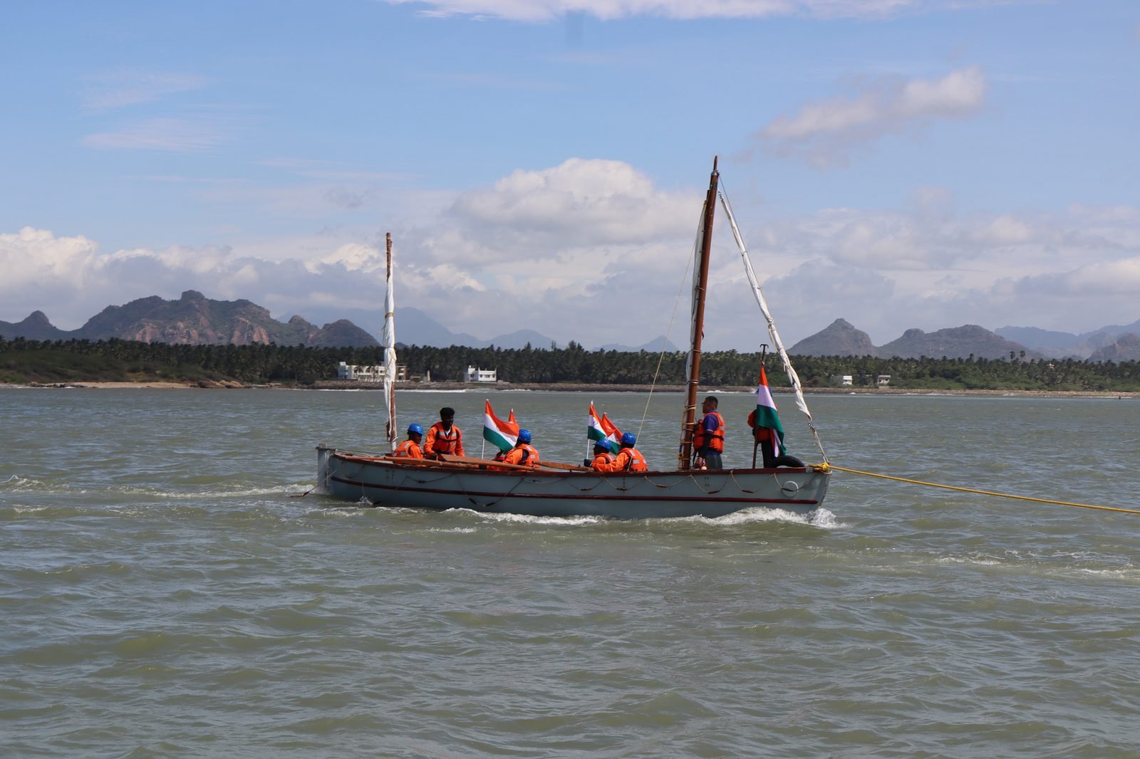 Cadets in whalers at sea with sails up