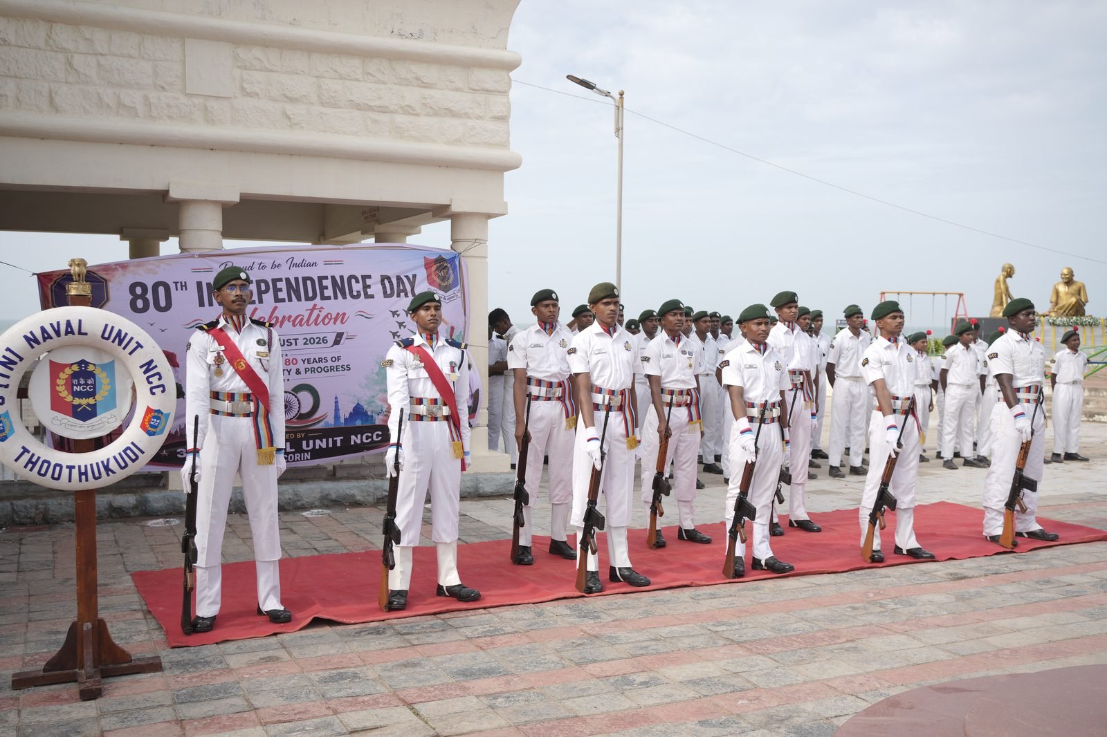 NCC cadets in white uniform presenting guard of honour at the 80th Independence Day celebration