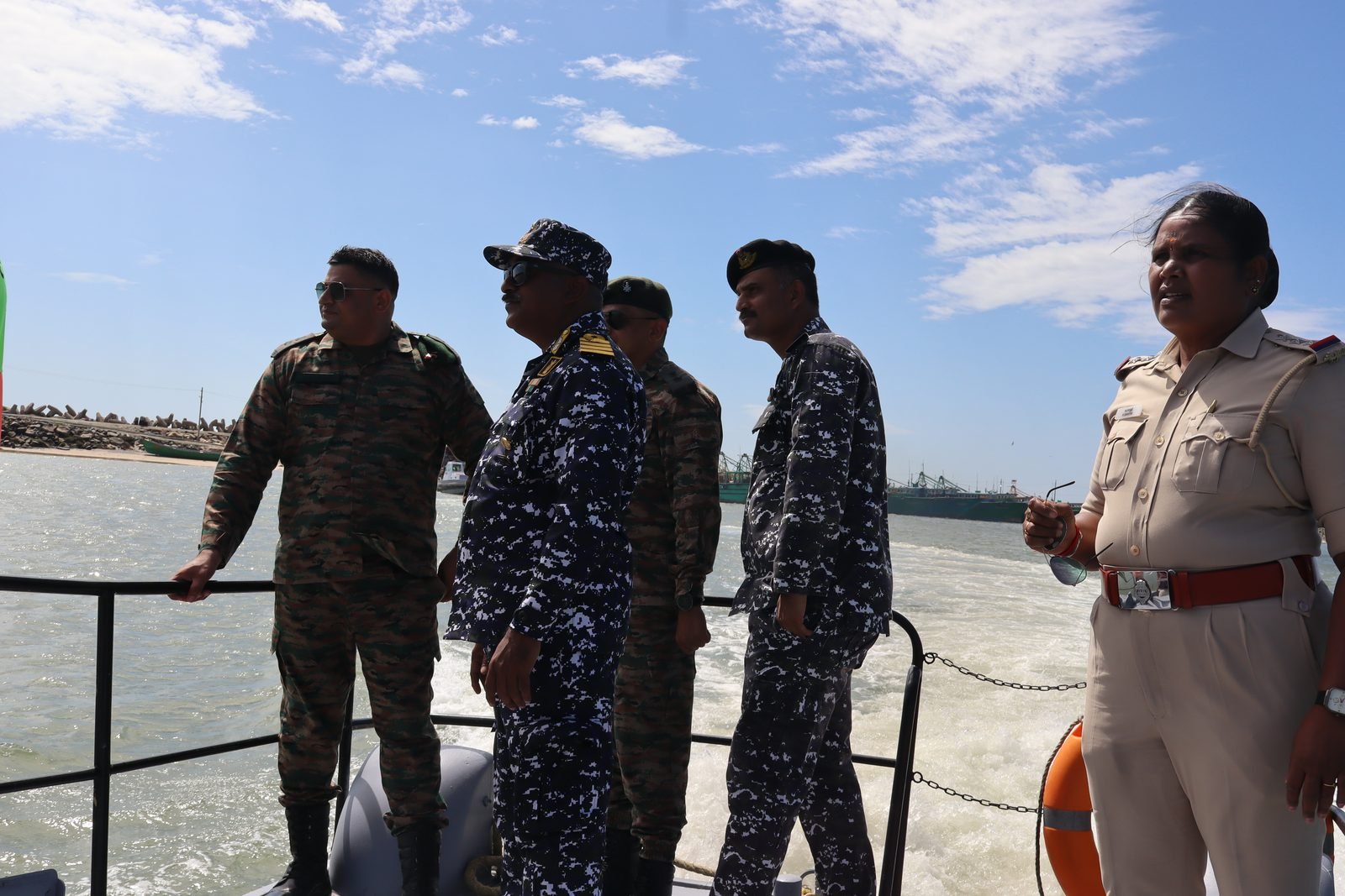 Officers and instructors at the harbour wall