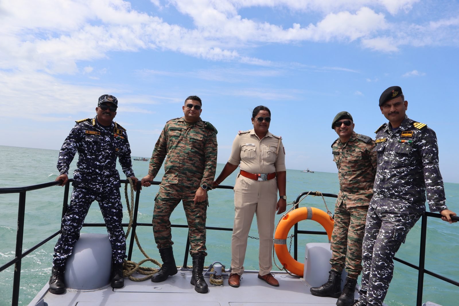 Officers at the end-of-day briefing on the beach