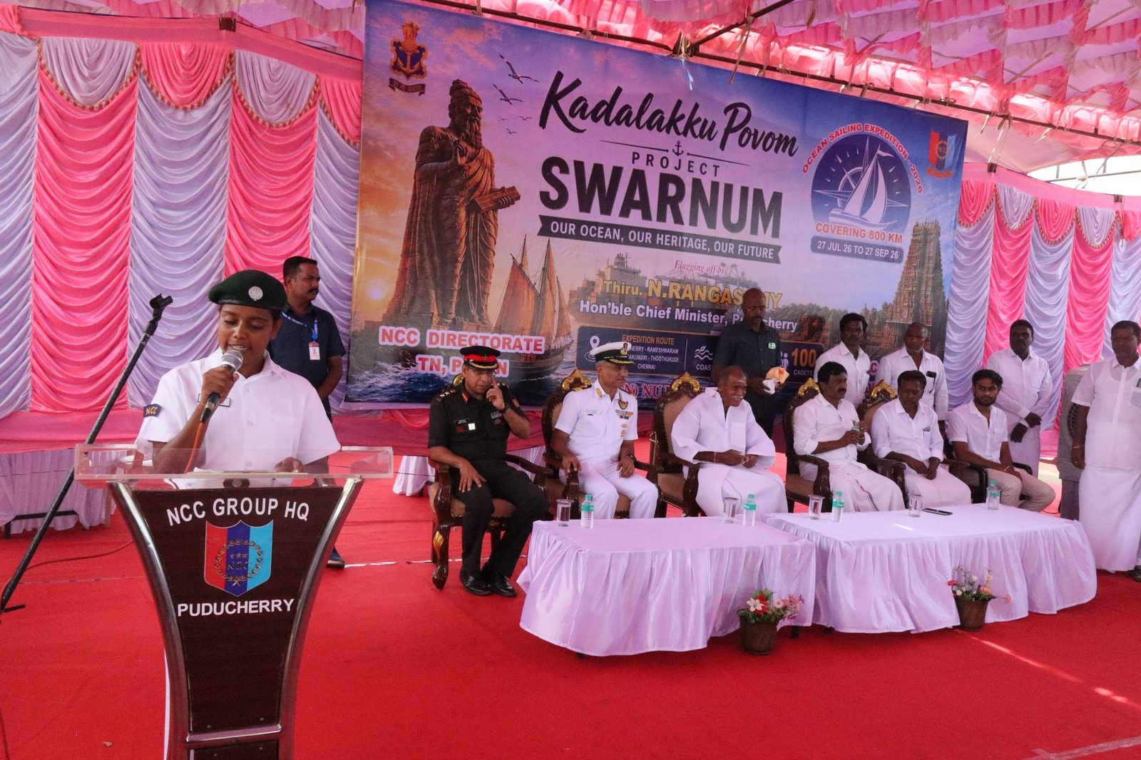 NCC cadet speaking at NCC Group HQ Puducherry podium before dignitaries