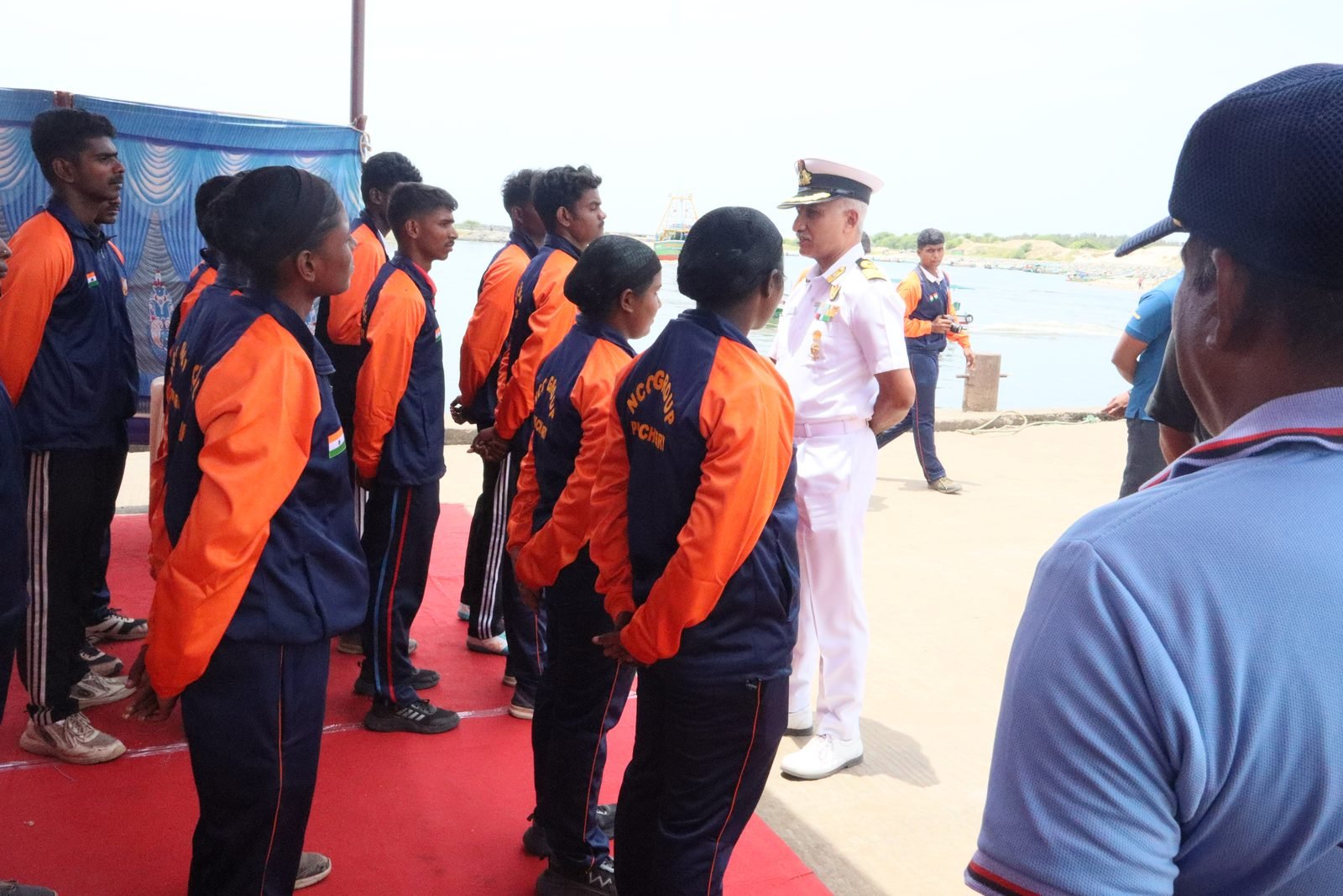 Cadets on the pier at sunrise before setting sail