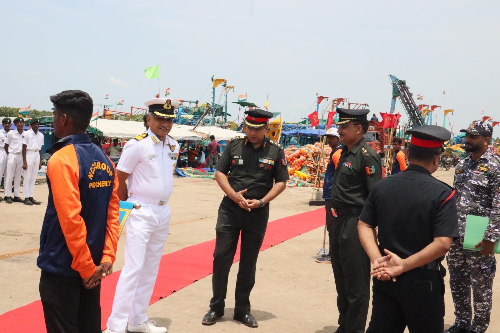 Cadets receiving sailing briefings on the shore