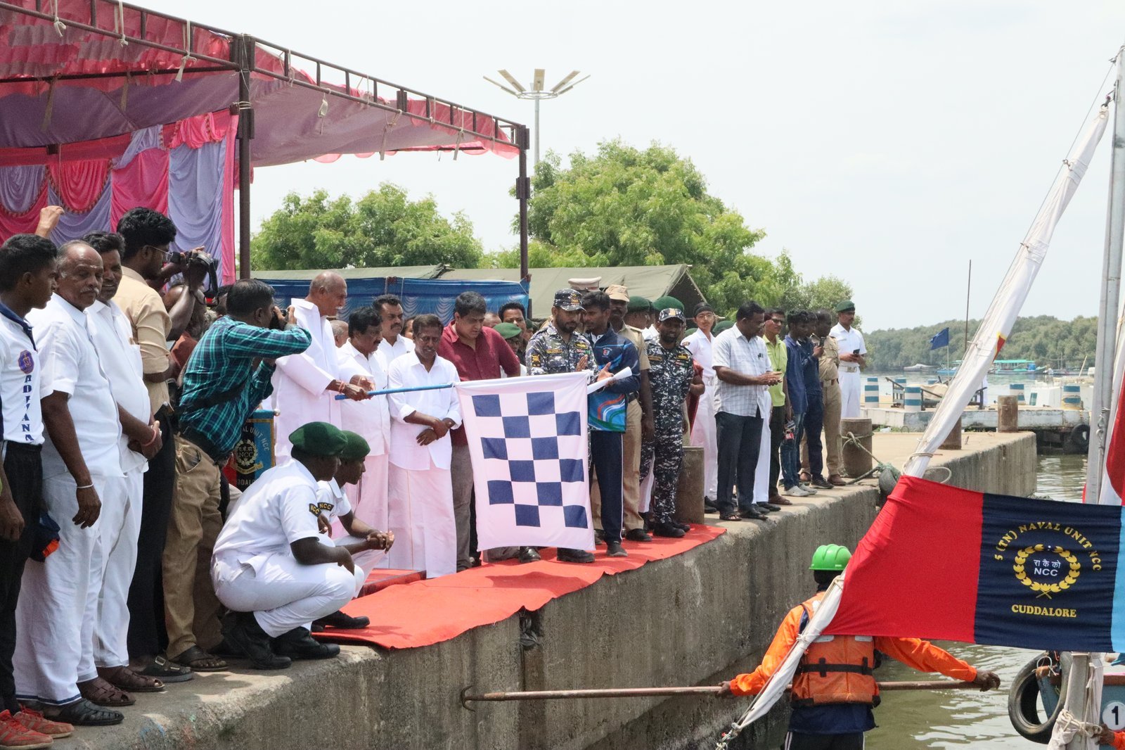 Puducherry Chief Minister N. Rangasamy waving the checkered flag to launch the expedition at the dock