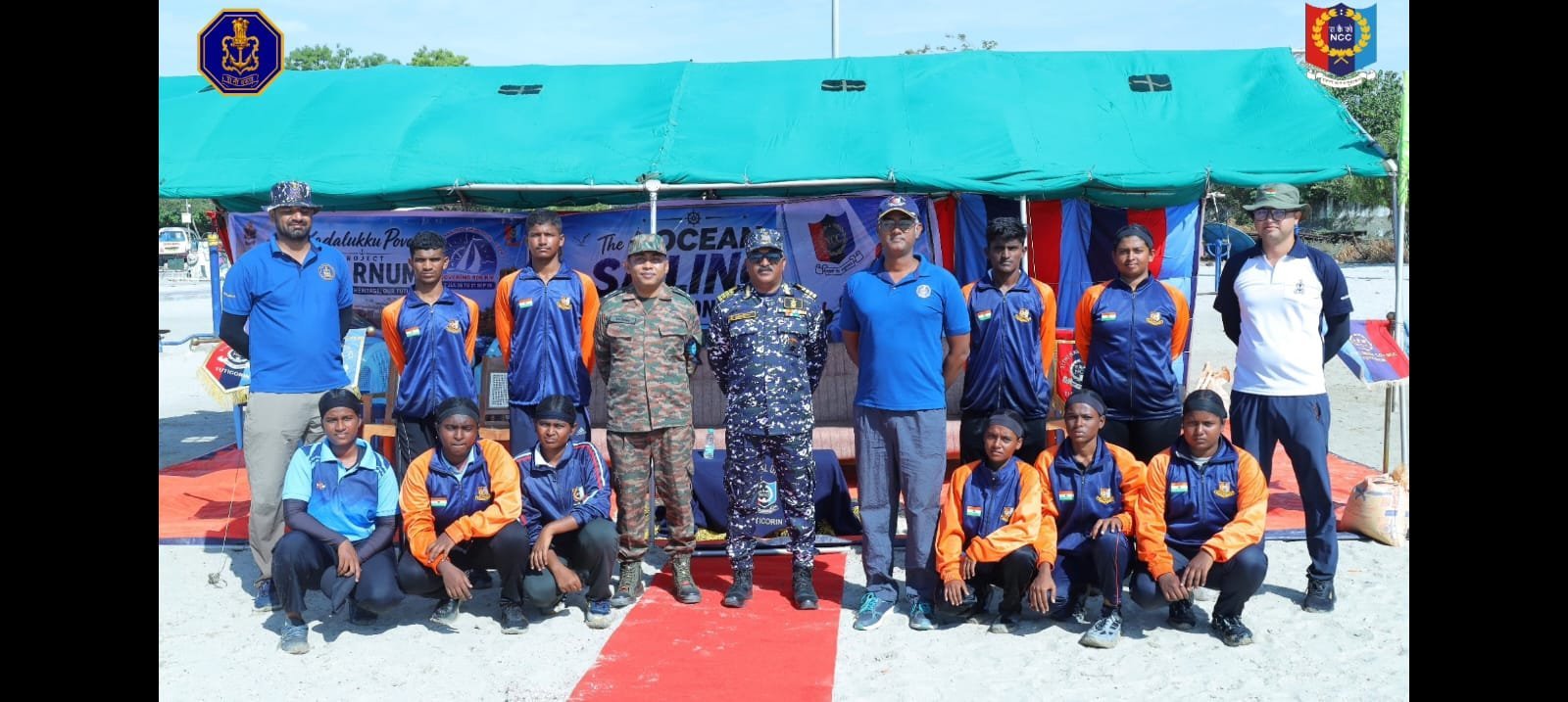 Team photo at the green beach camp tent with Project SWARNUM banners at Thoothukudi seafront